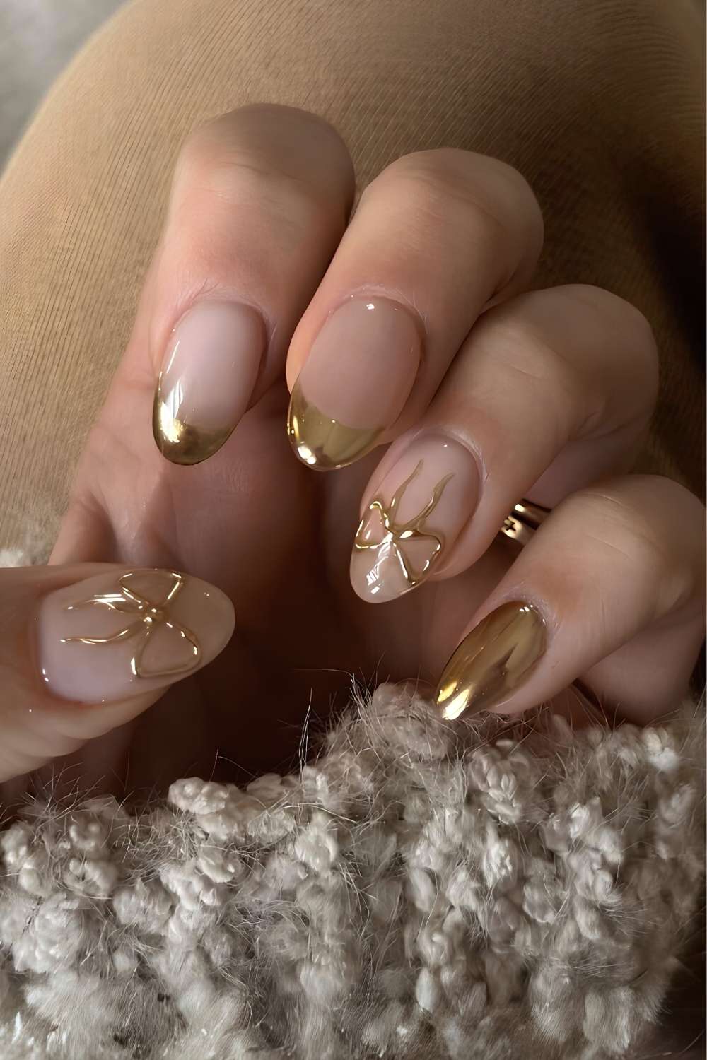 Gold chrome French tips with bow accent
