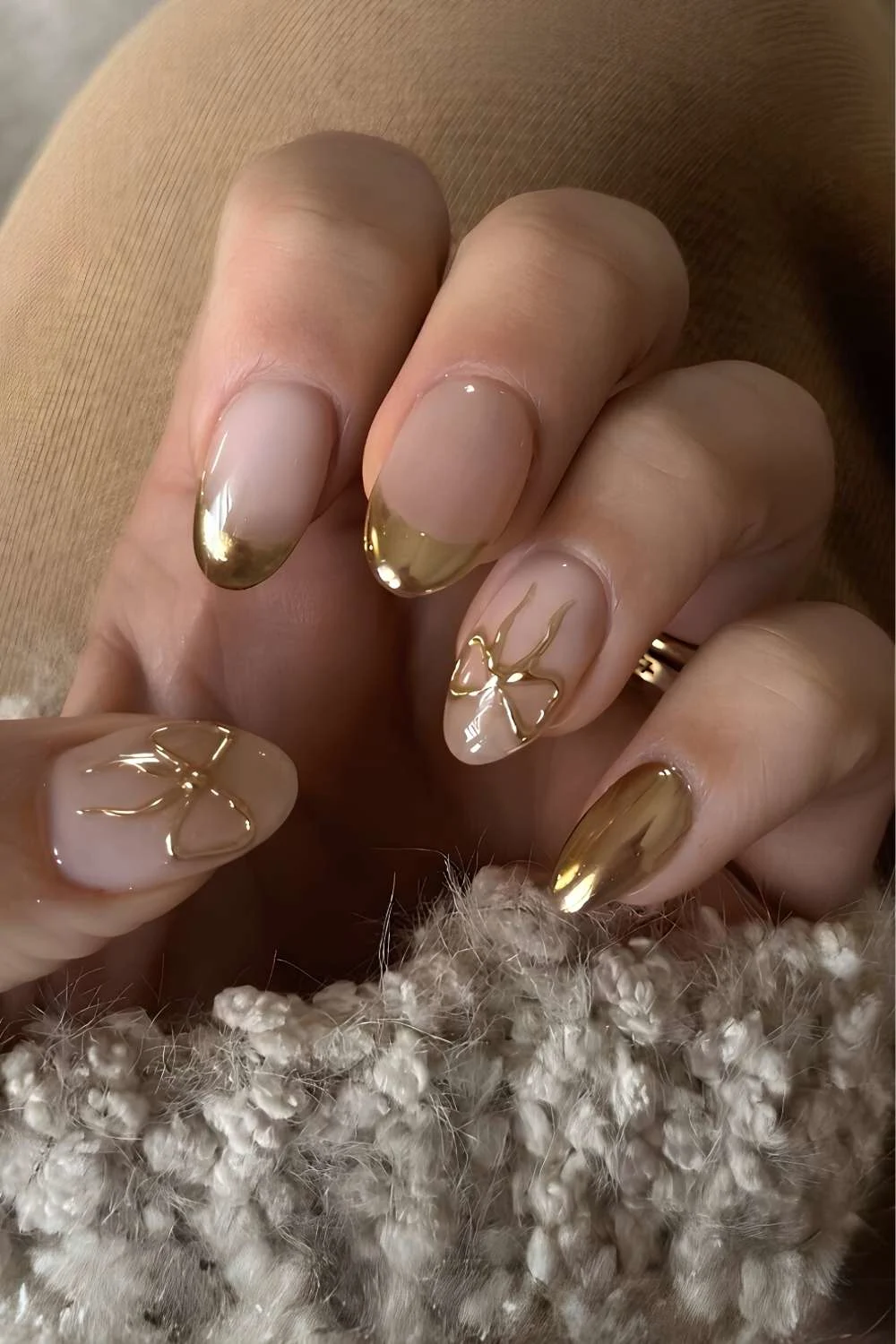 Gold chrome French tips with bow accent