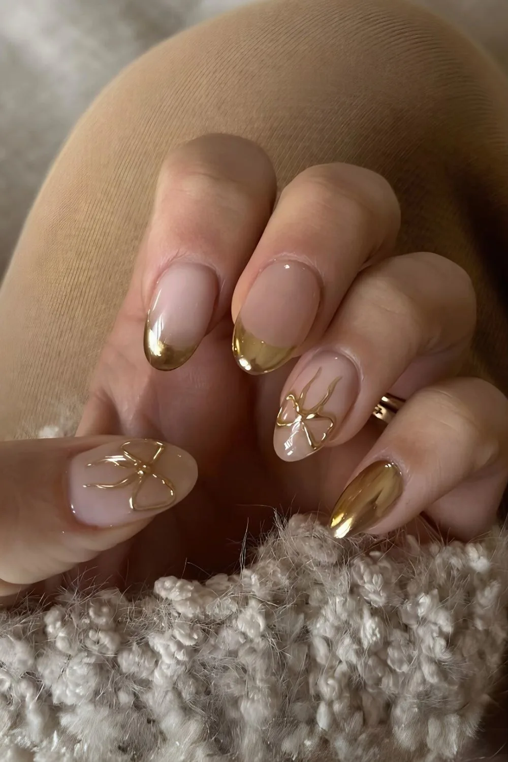 Gold chrome French tips with bow accent