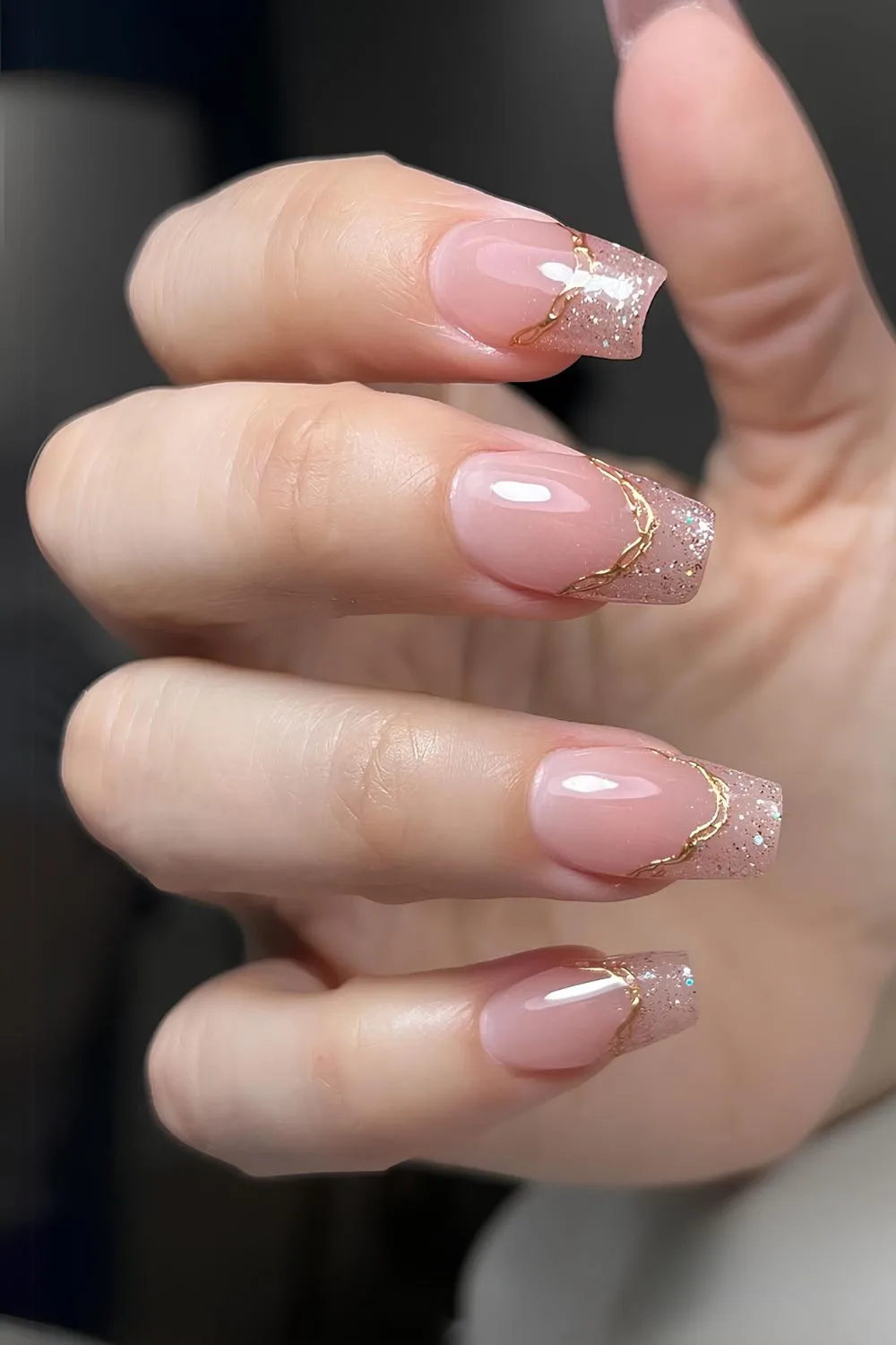 Gold chrome and glitter French nails