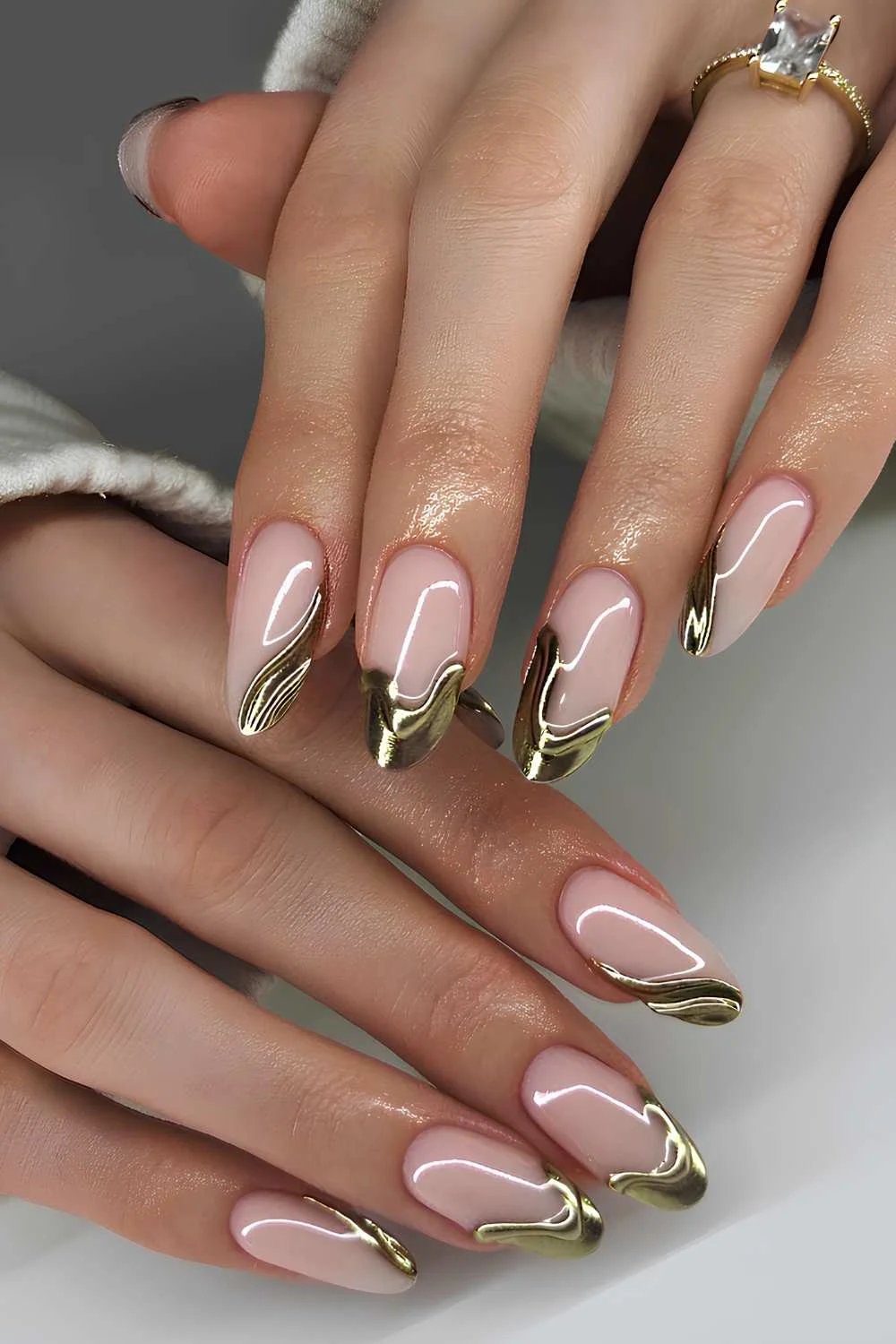 Gold chrome drip effect French manicure