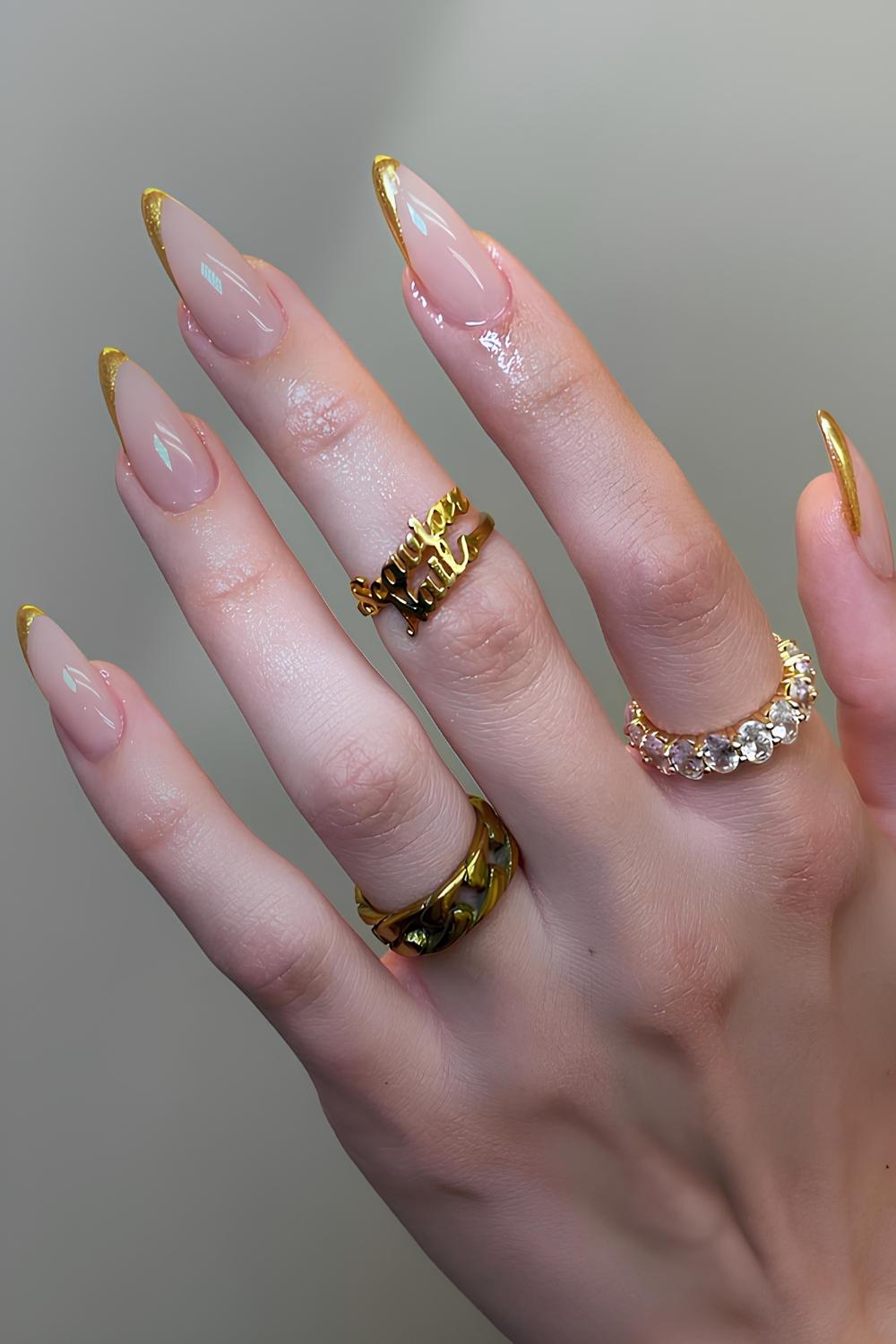 Gold diagonal French manicure