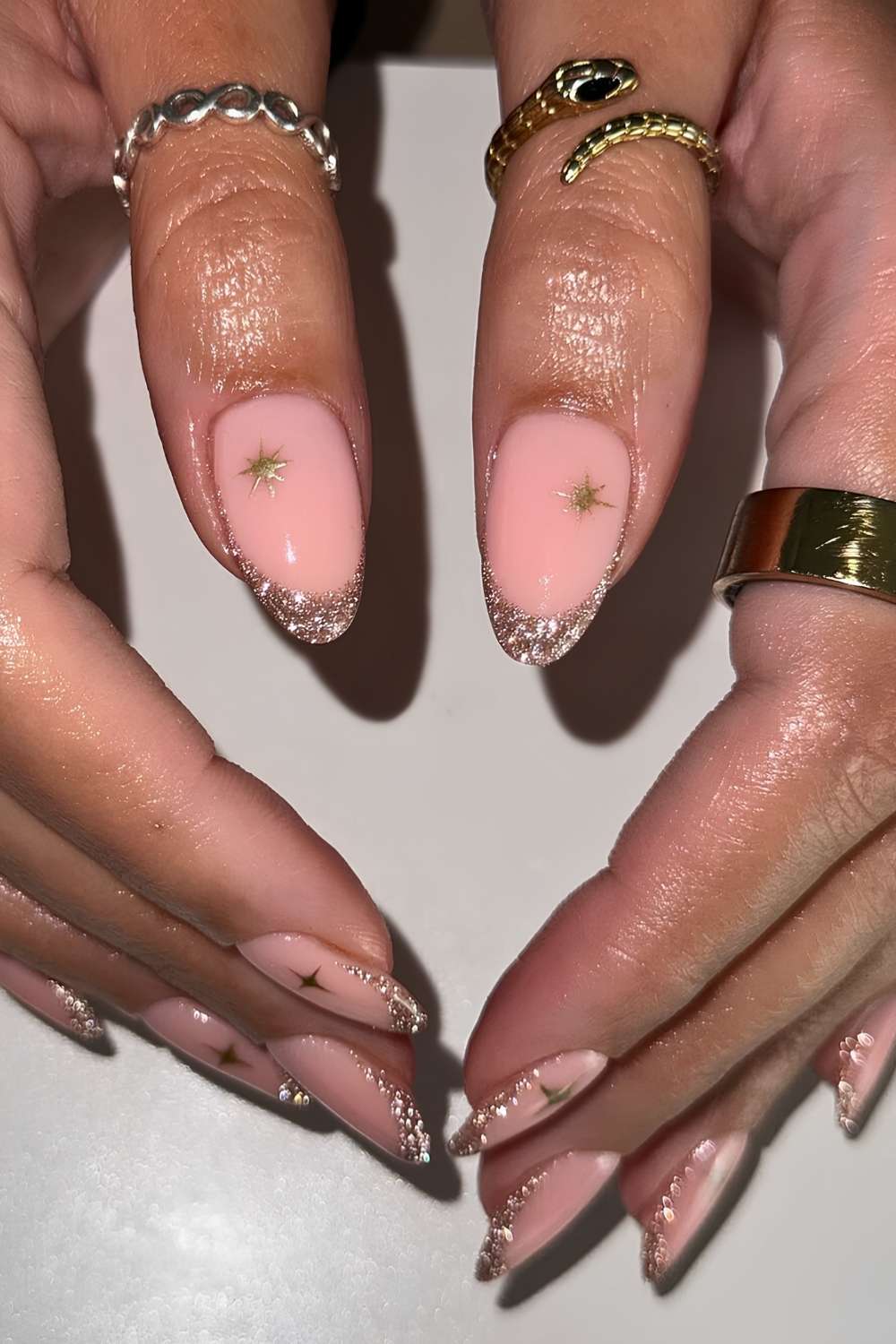Gold glitter French mani with celestial art