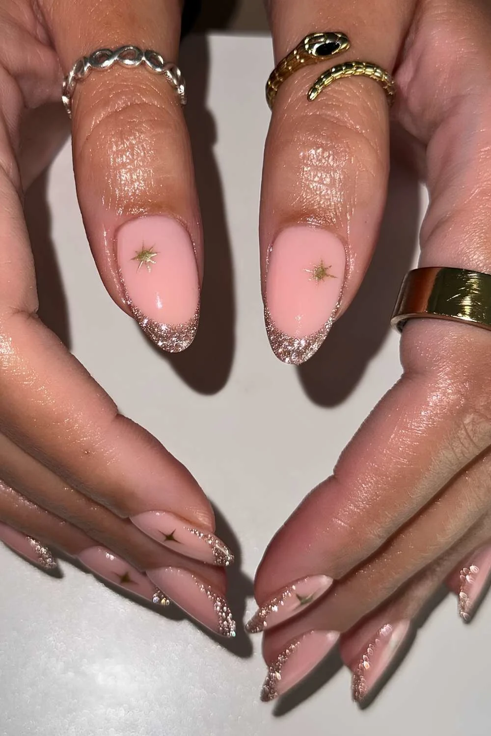 Gold glitter French mani with celestial art