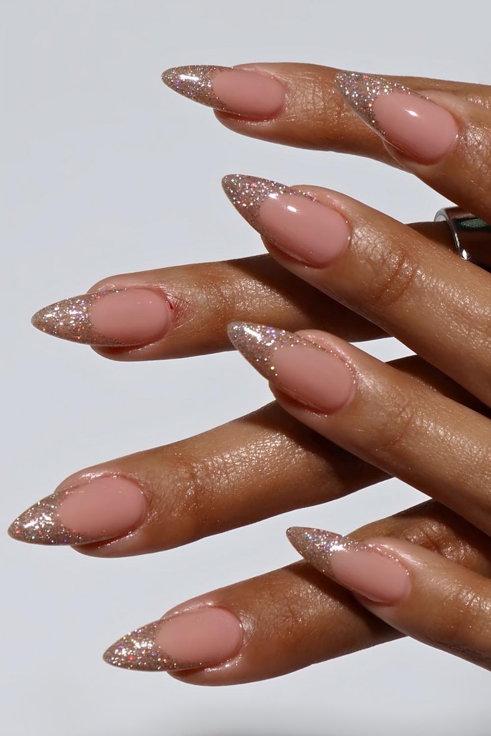 Gold glitter French tip nail design