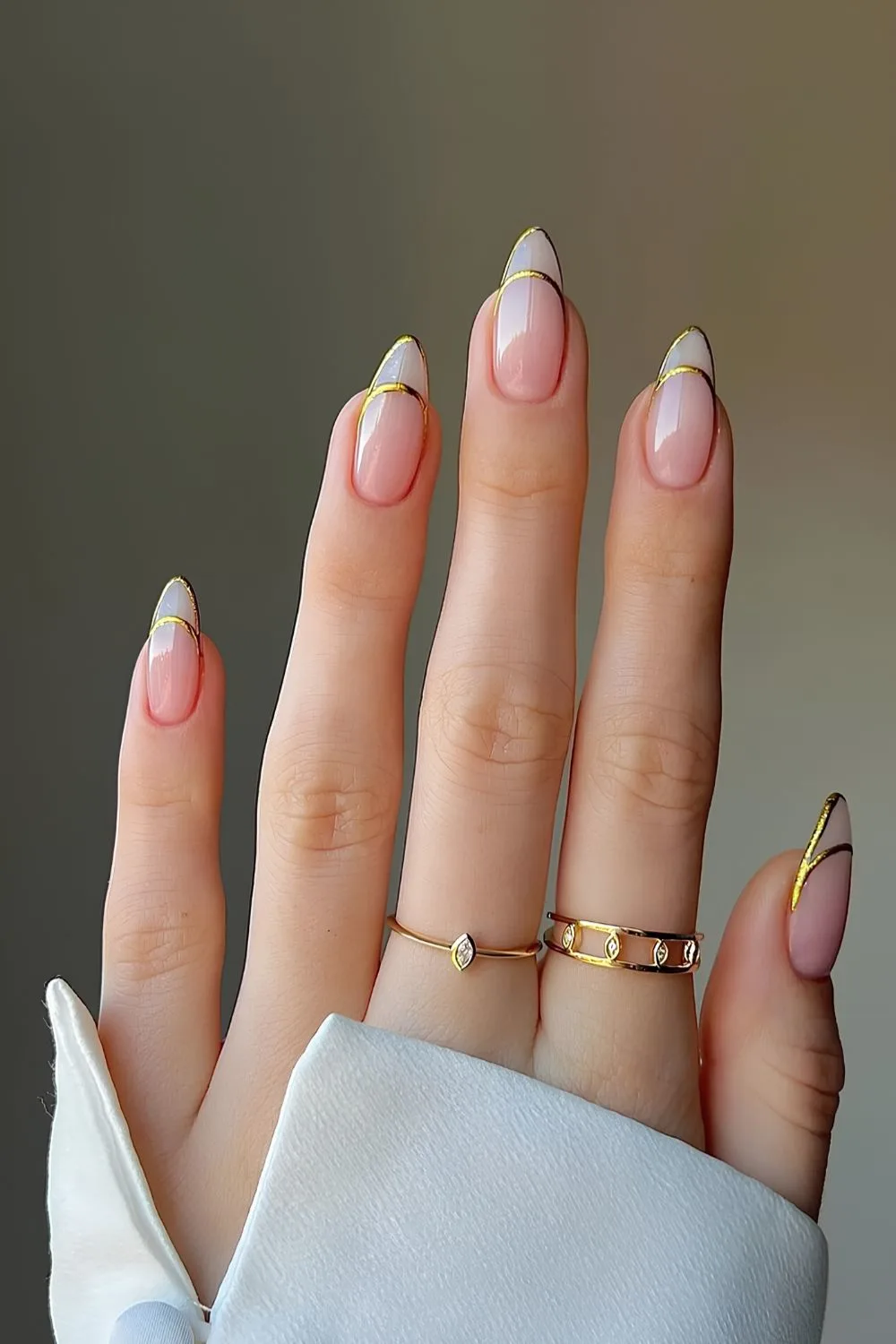 Gold outline french tip mani