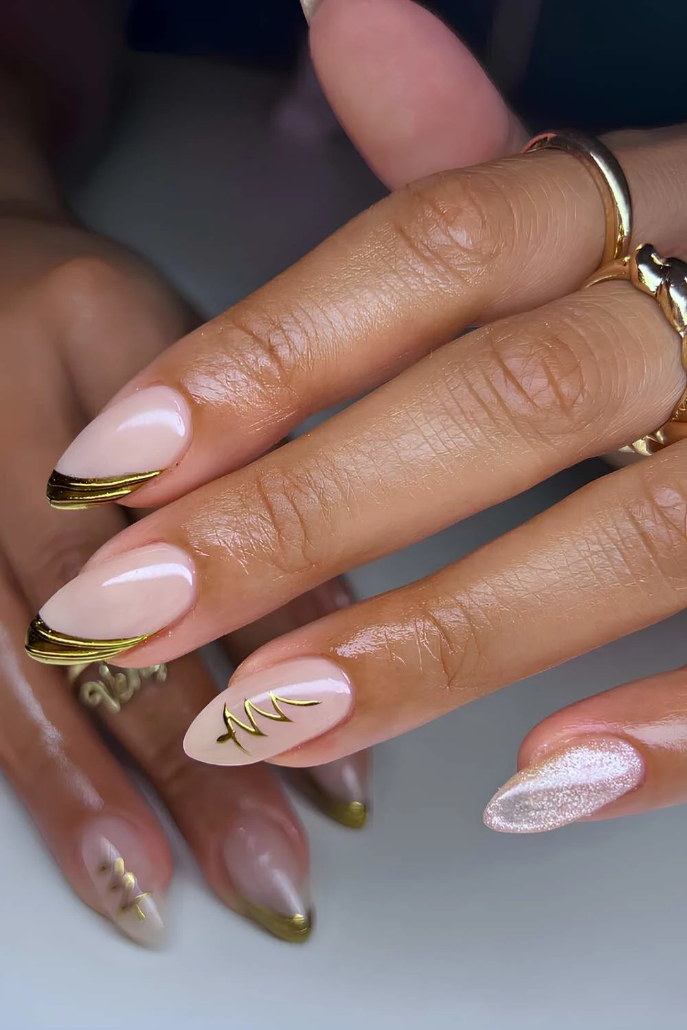 Gold side French mani with Christmas tree art