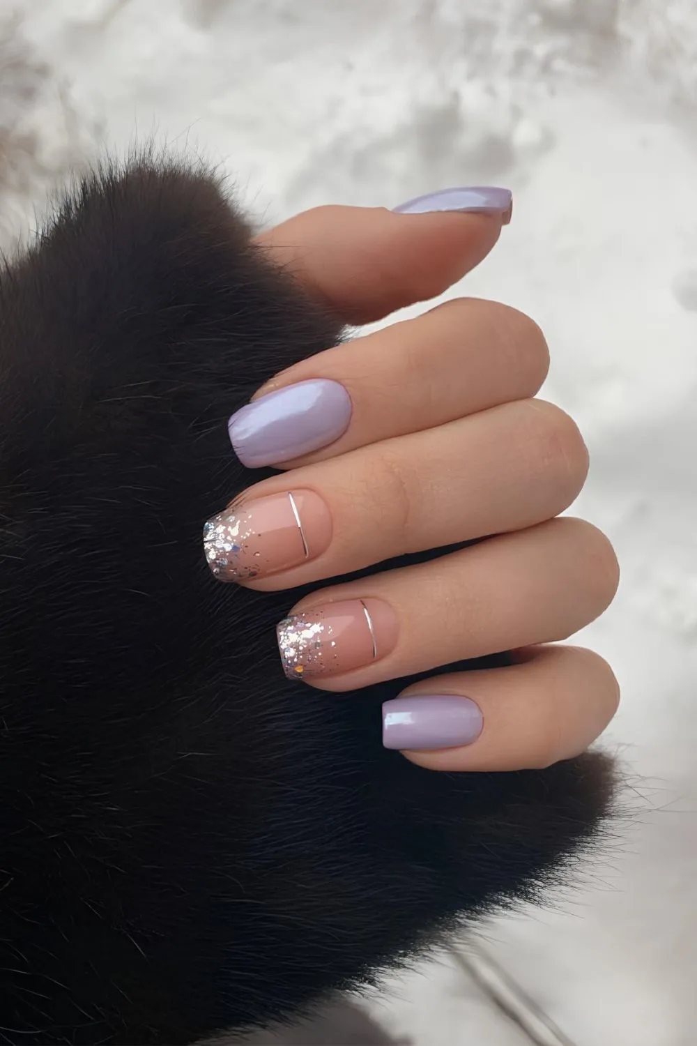 Icy lavender nails with glitter accents