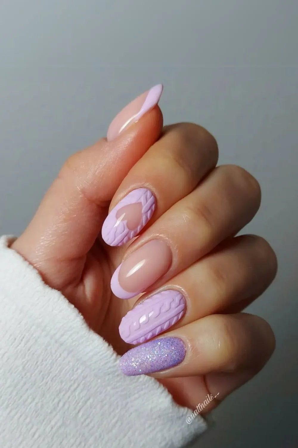 Lavender nails with glitter and sweater patterm