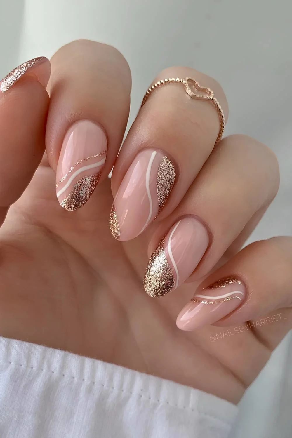 Milky nails with gold glitter and line art