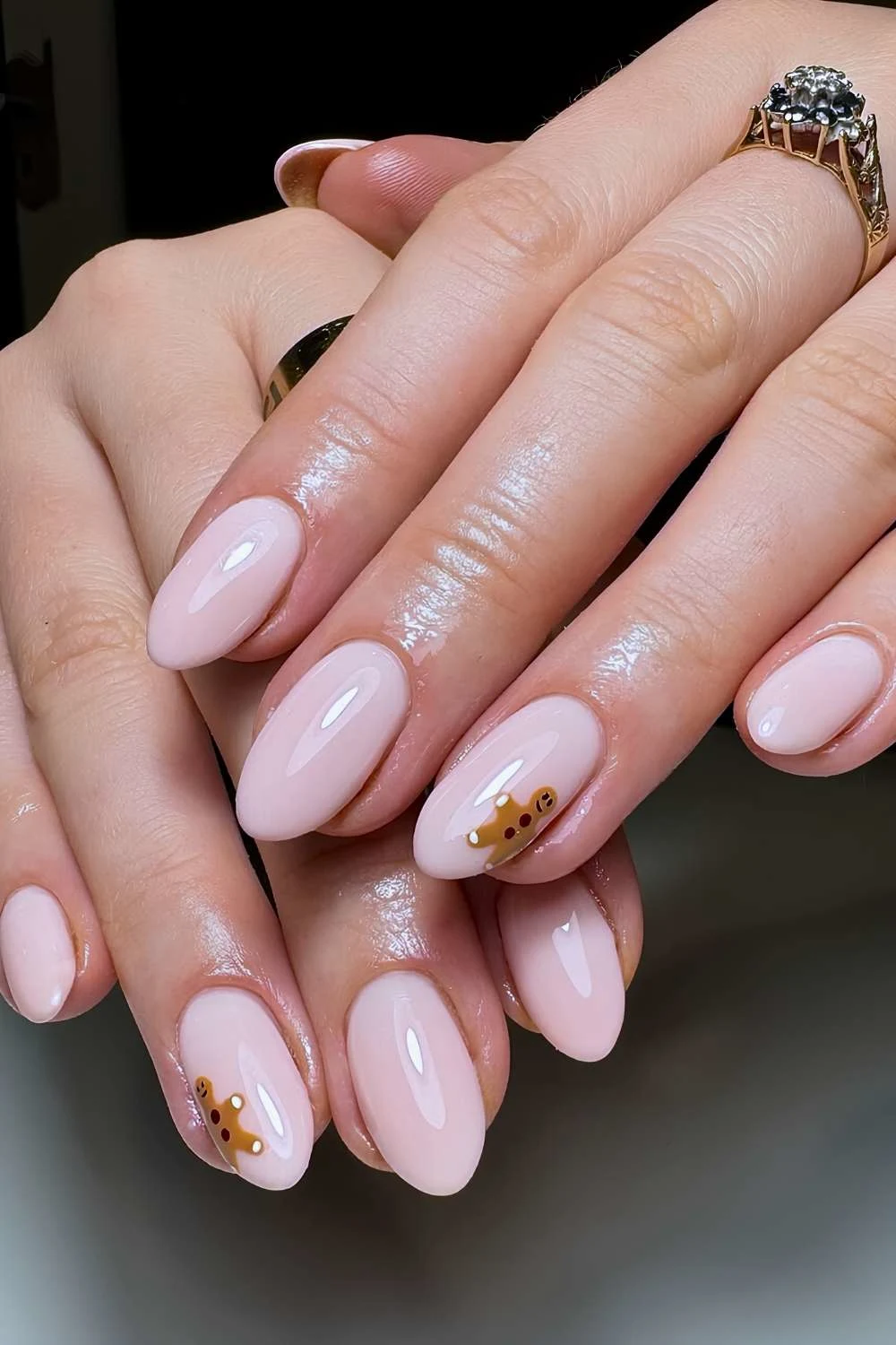 Milky nails with minimalist gingerbread cookie art