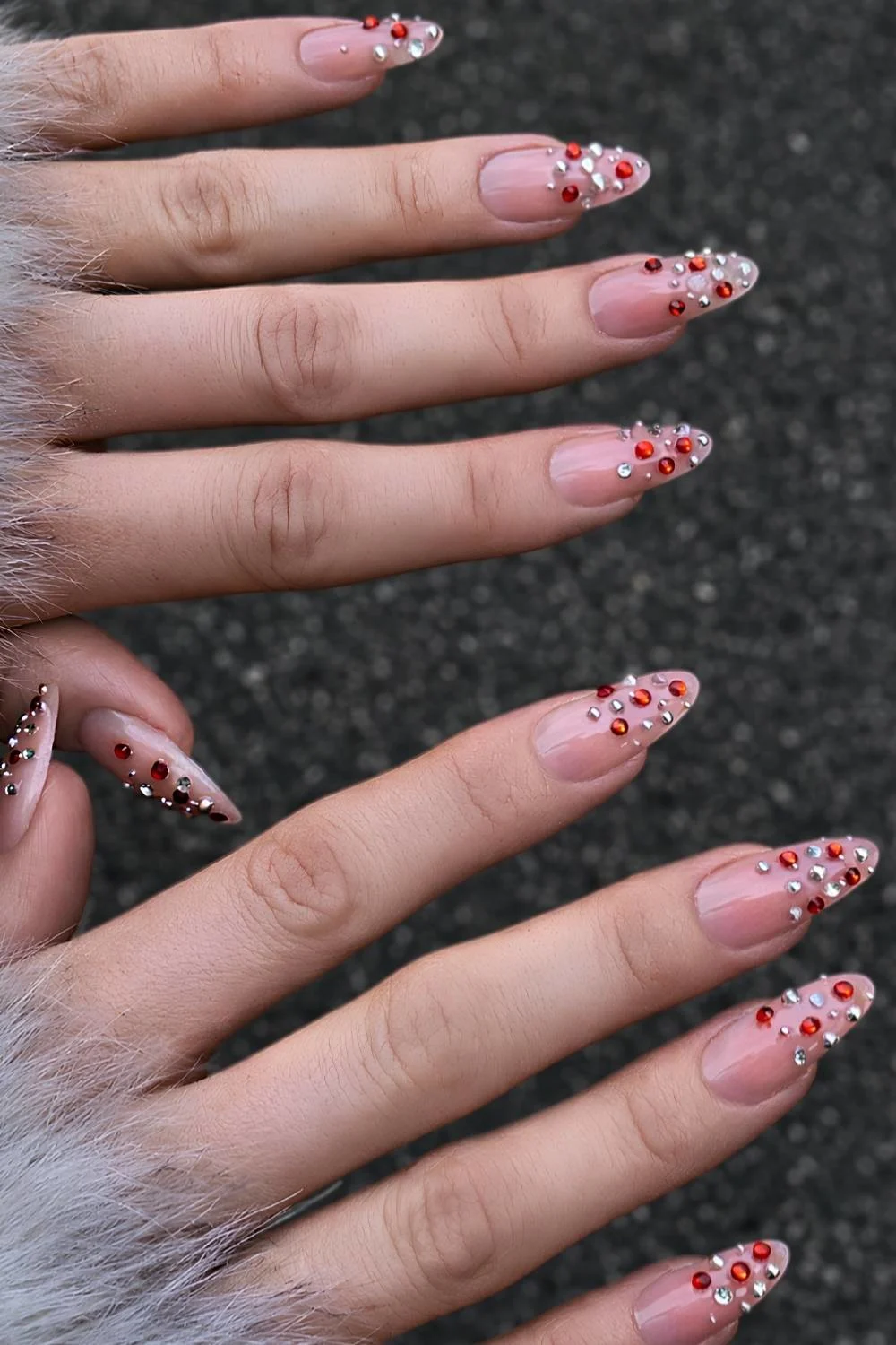 Milky nails with red and silver gems