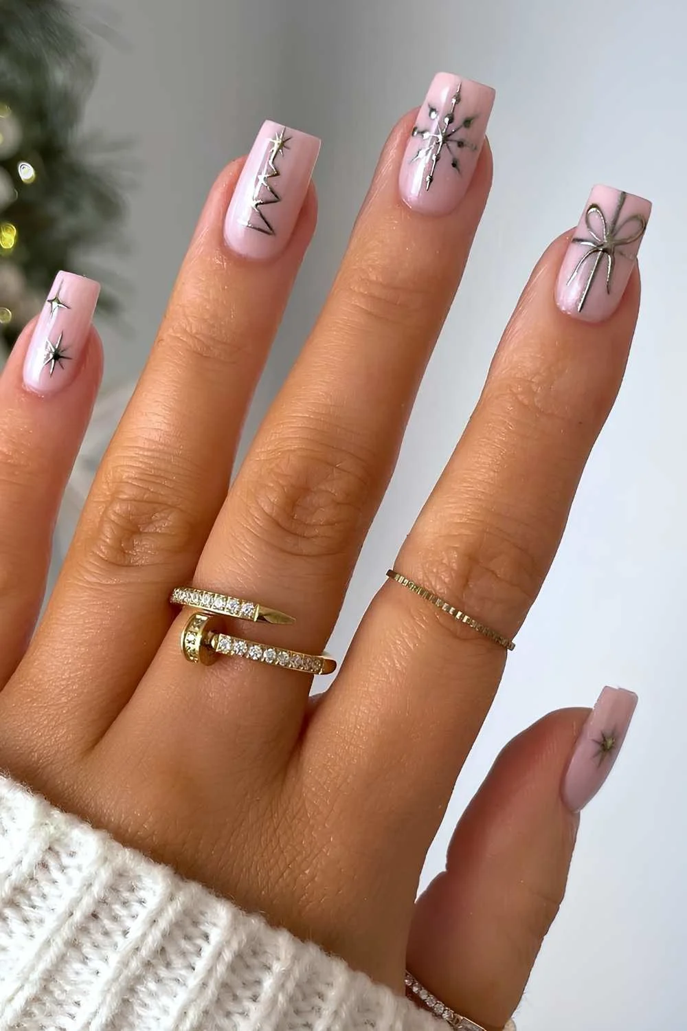 Milky nails with silver chrome Christmas art