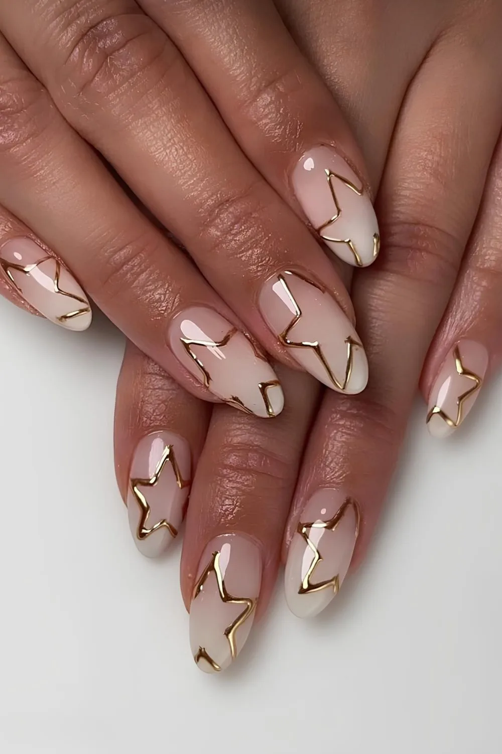 Milky white base with gold chrome stars