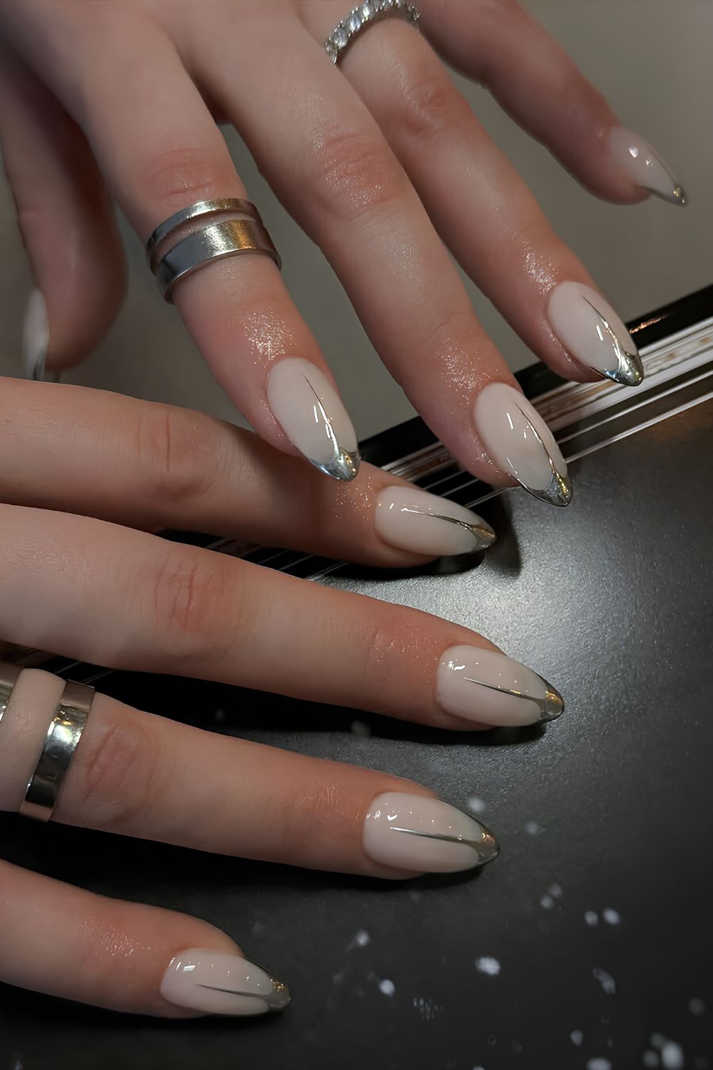 Milky white mani with silver abstract tips