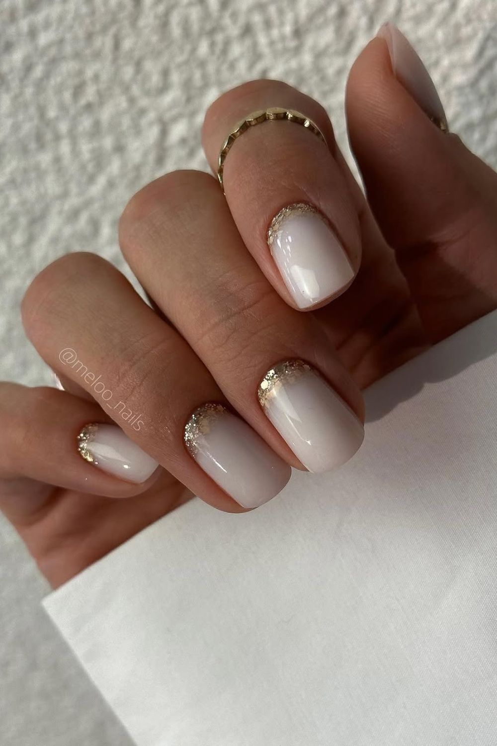 Milky white nails with princess effect