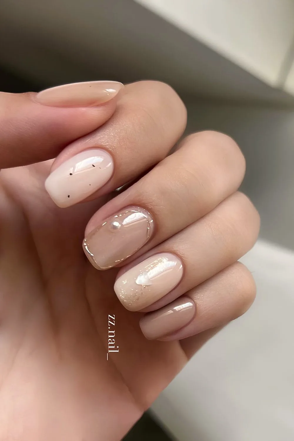 Mocha mousse and beige nails with pearls