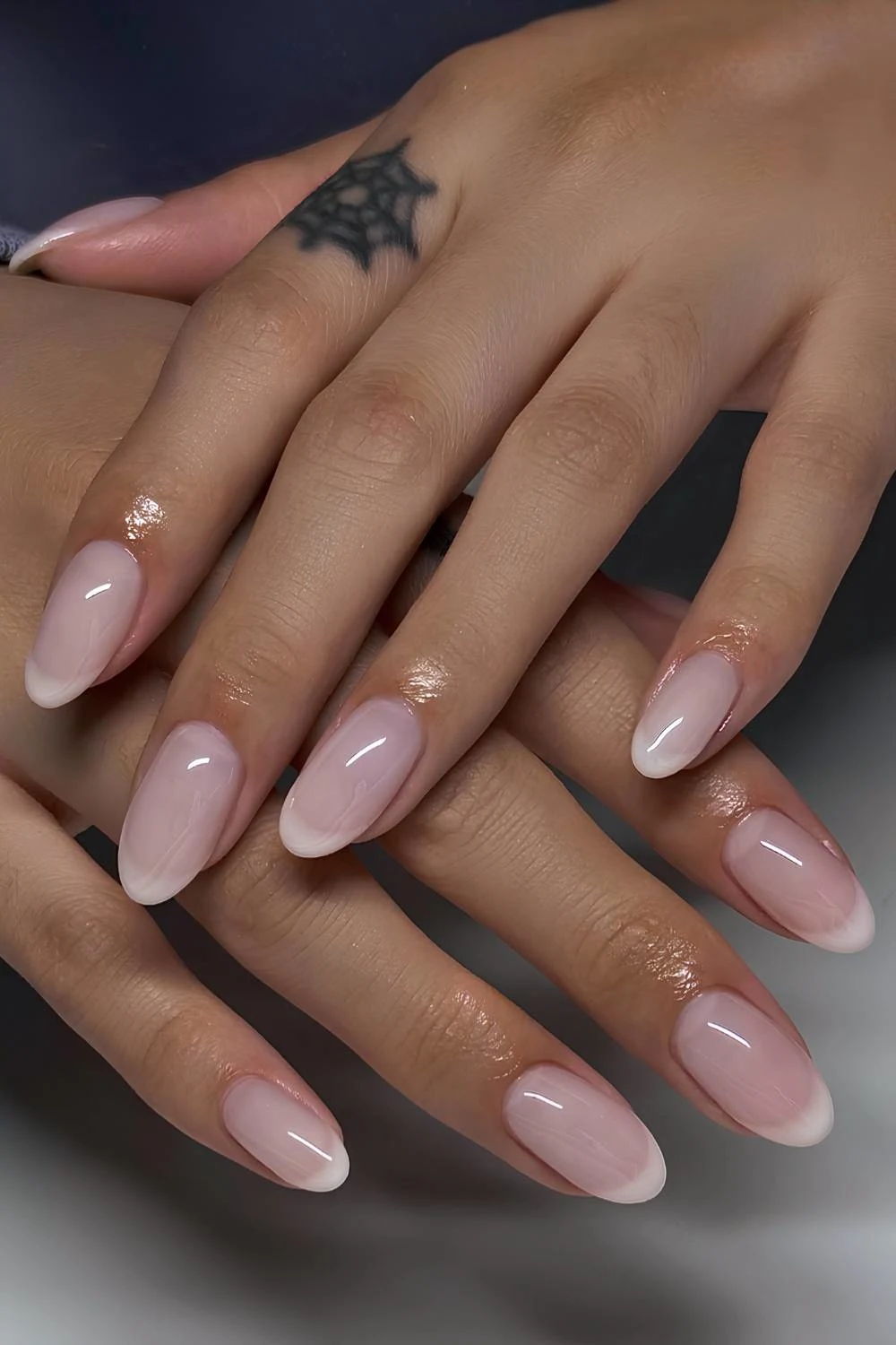 Neutral French tips on a milky base