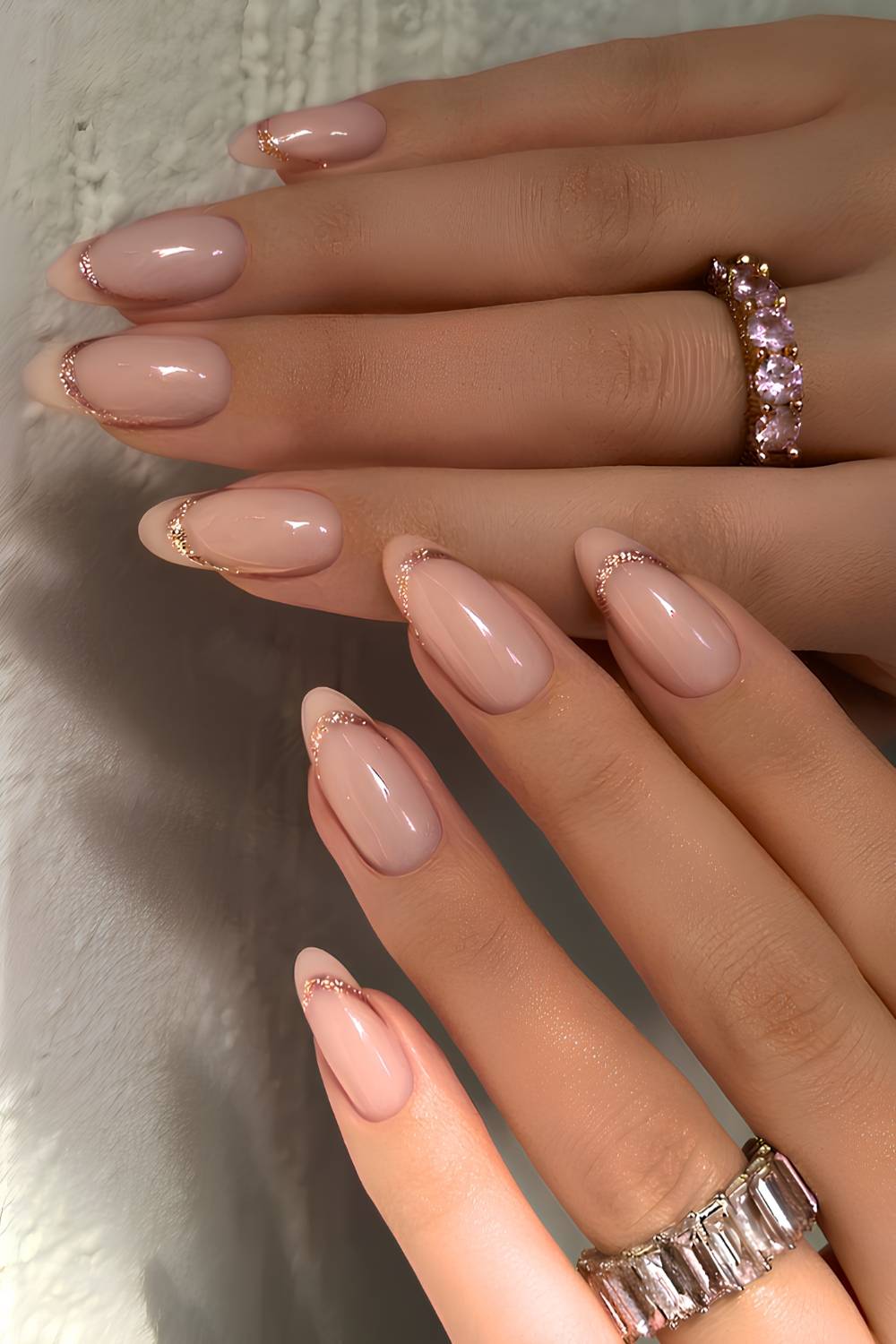 Neutral glitter-edged French tip nails