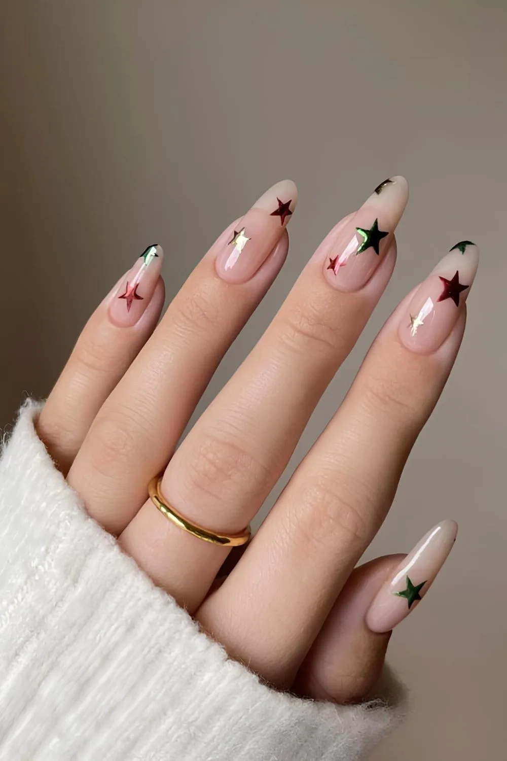 Nude nails with red and green stars