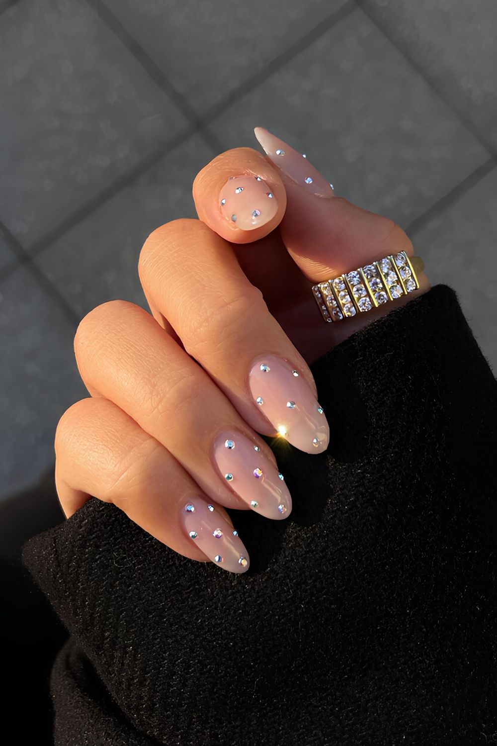 Nude nails with rhinestone accents