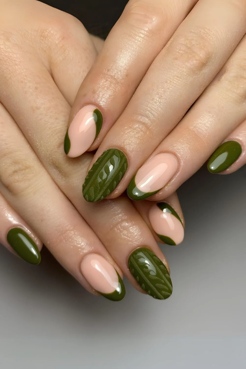 Olive green nails with cable knit pattern accent