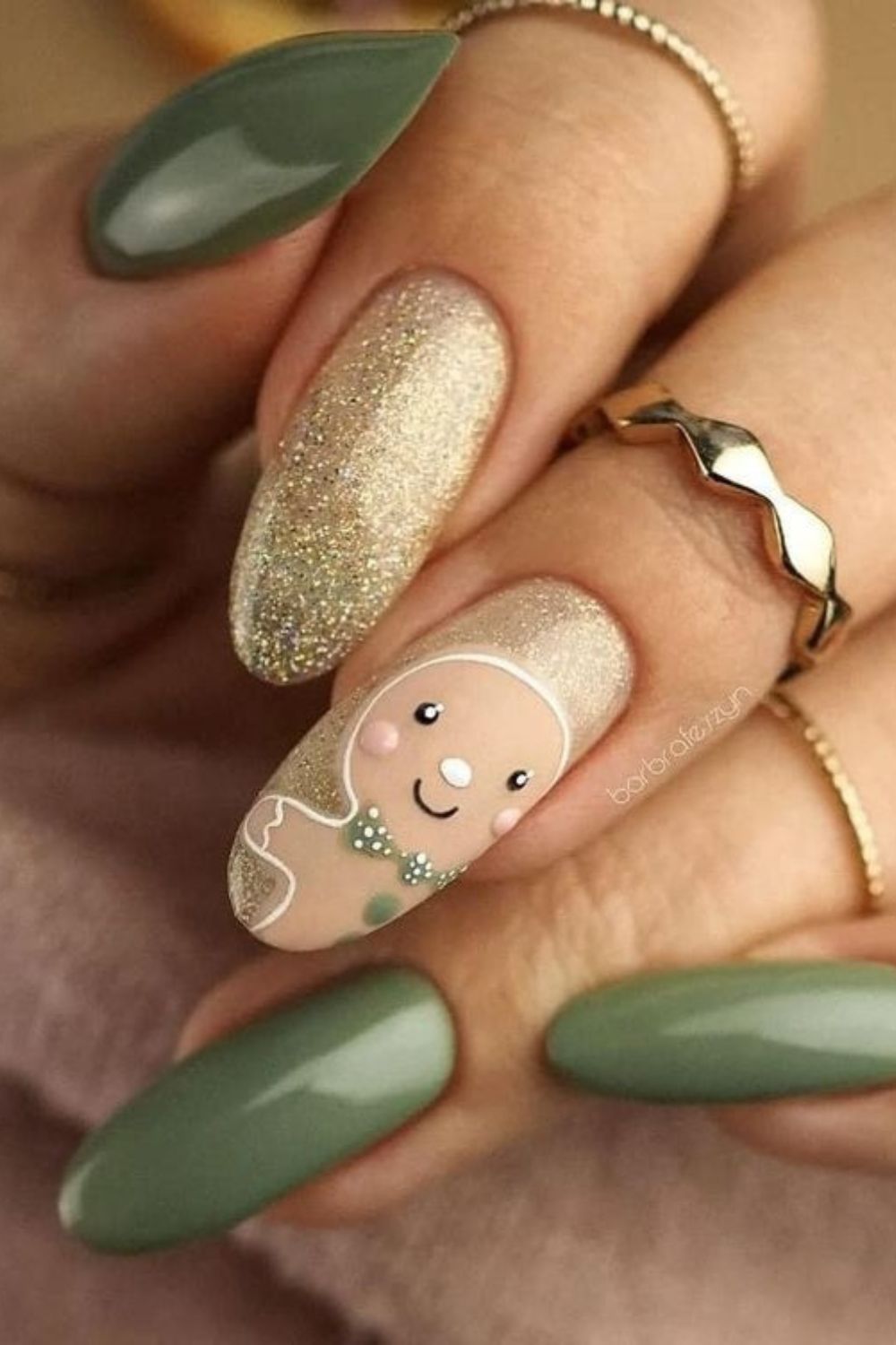 Olive green nails with gold shimmer and gingerbread accent