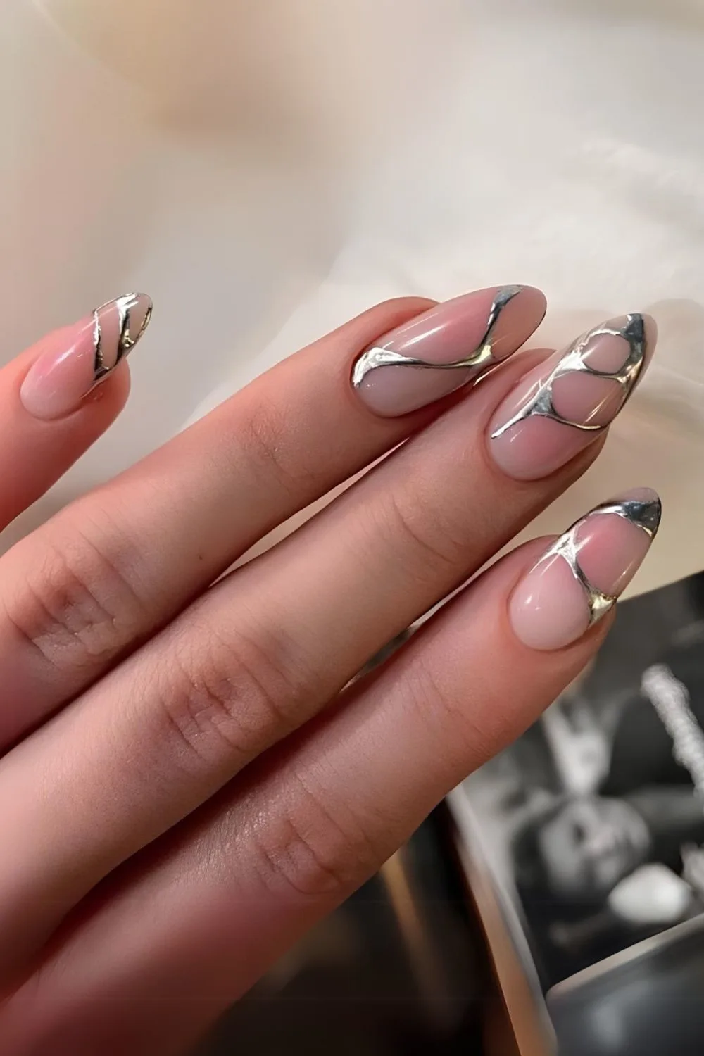 Pink aura nails with silver swirls