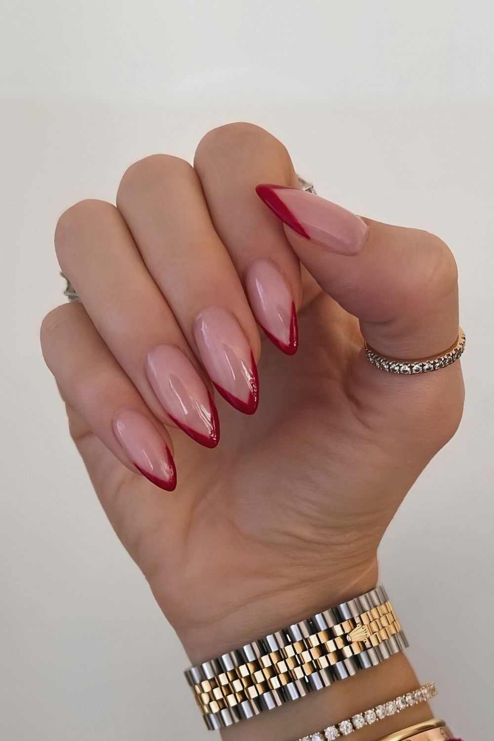 Pointed red French tip nails