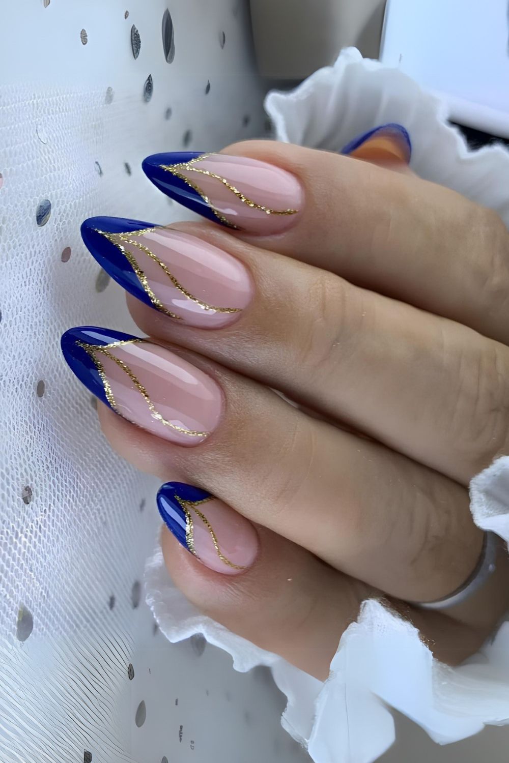 Pointed sapphire blue french nails