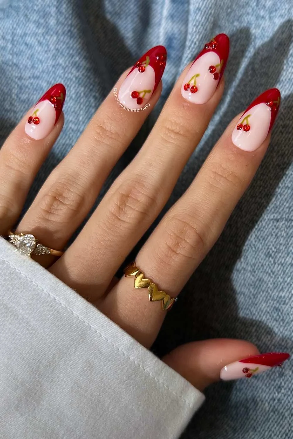 Red French mani with cherry gem accents