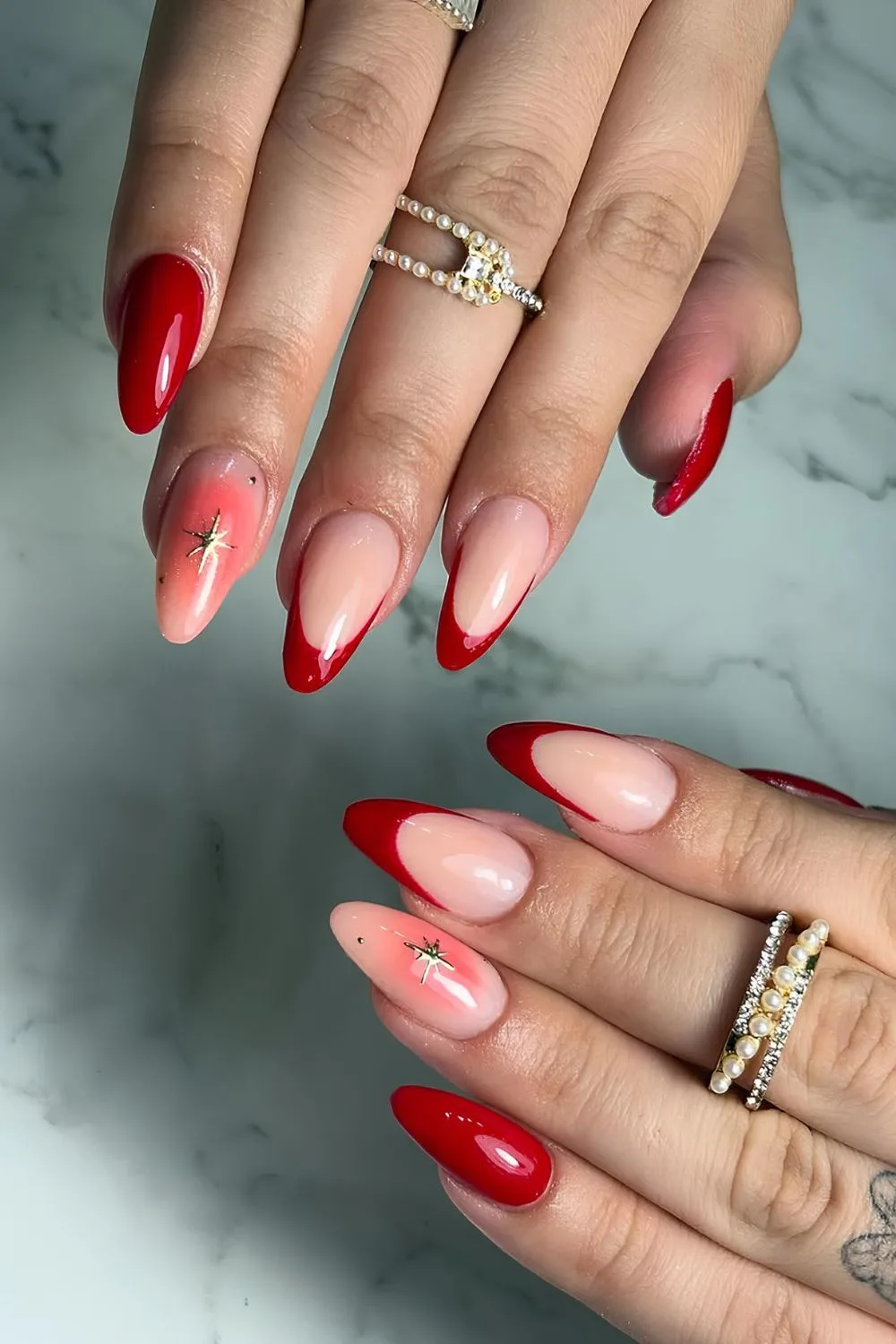 Red French nails with aura accent nail