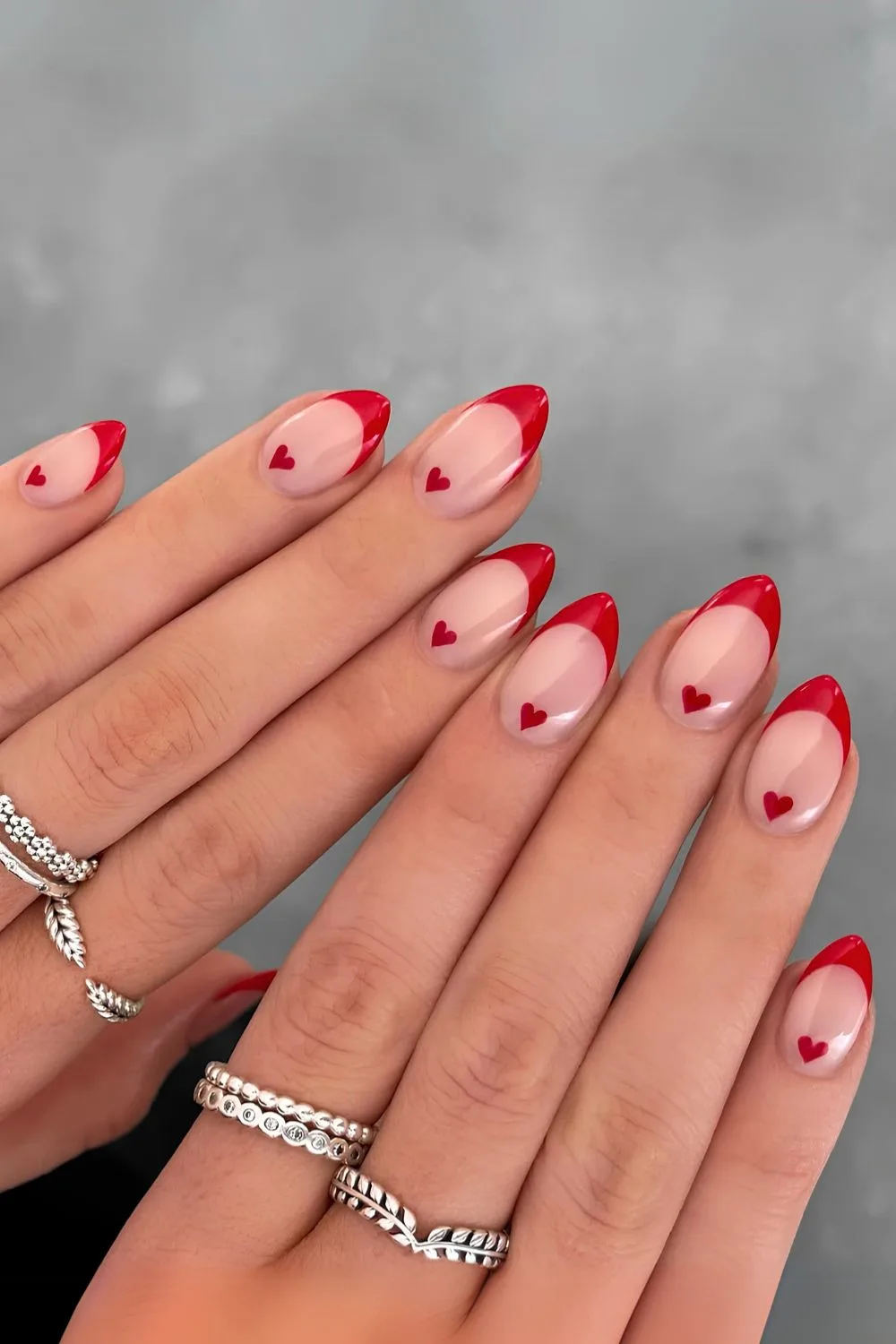 Red French nails with hearts