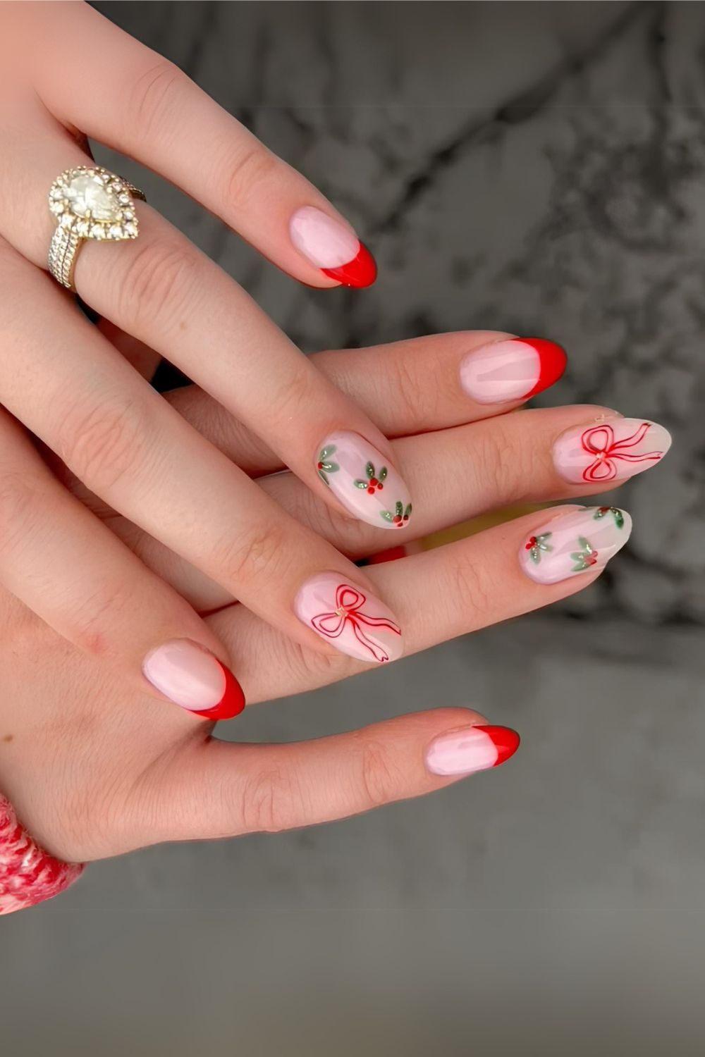 Red French nails with holly berries and bows