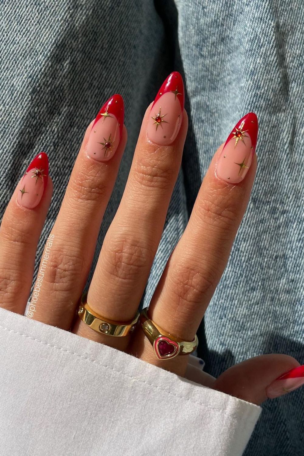 Red French tip nails with stars