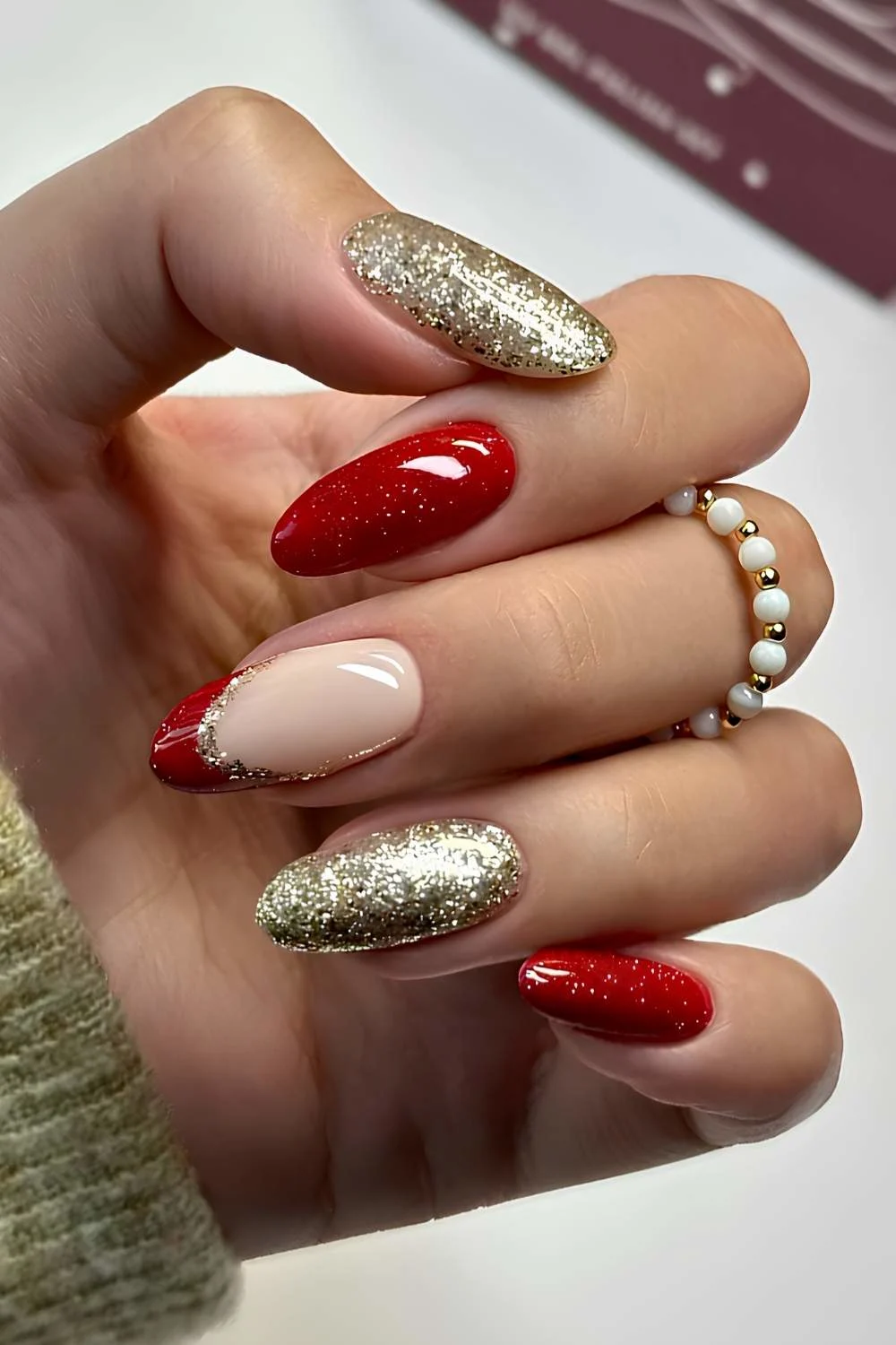 Red and gold glitter Christmas nails