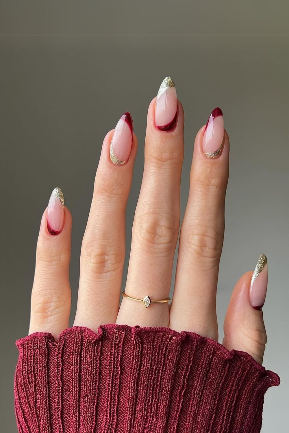 Red and gold upside-down French nails