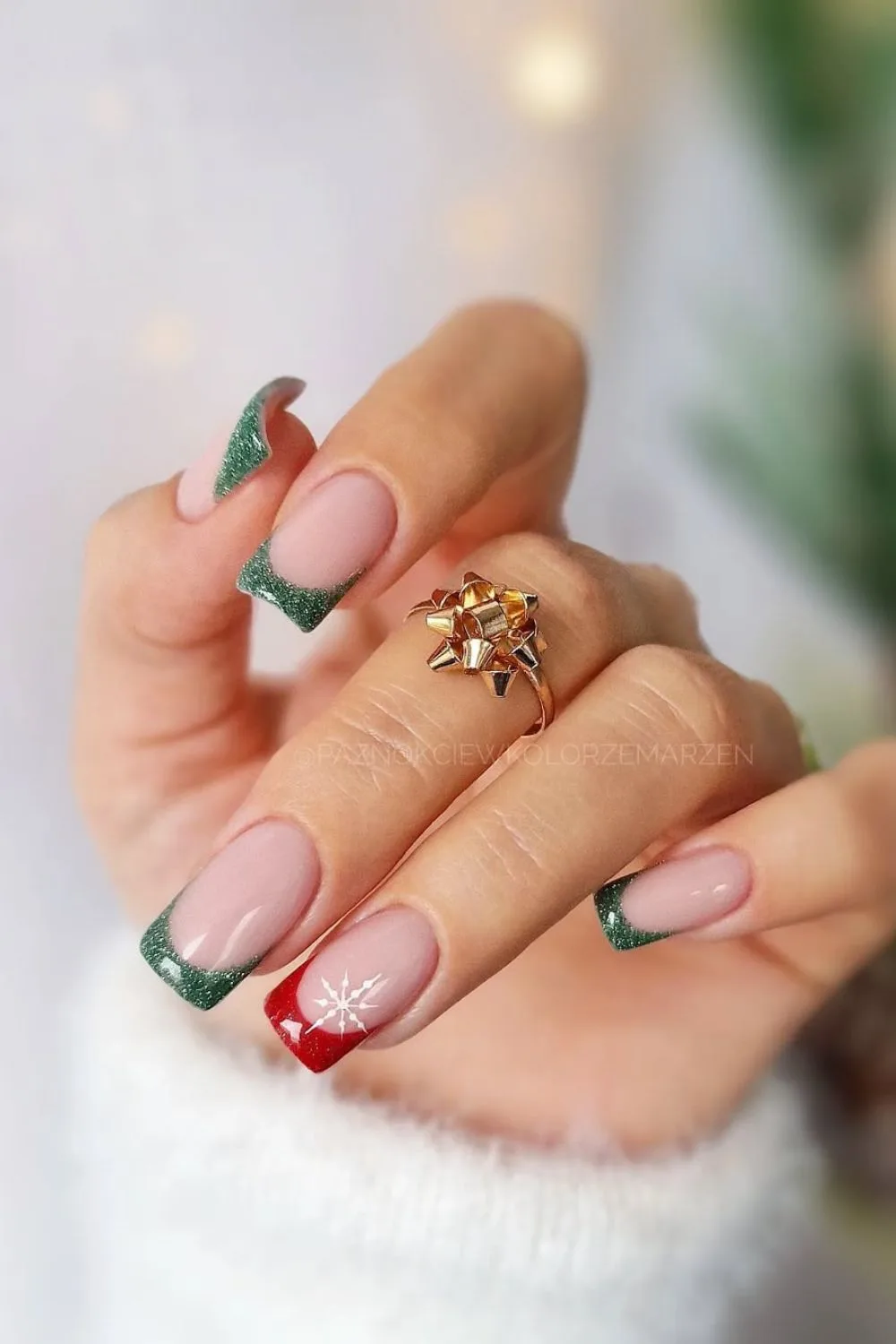 Red and green French nails with snowflakes