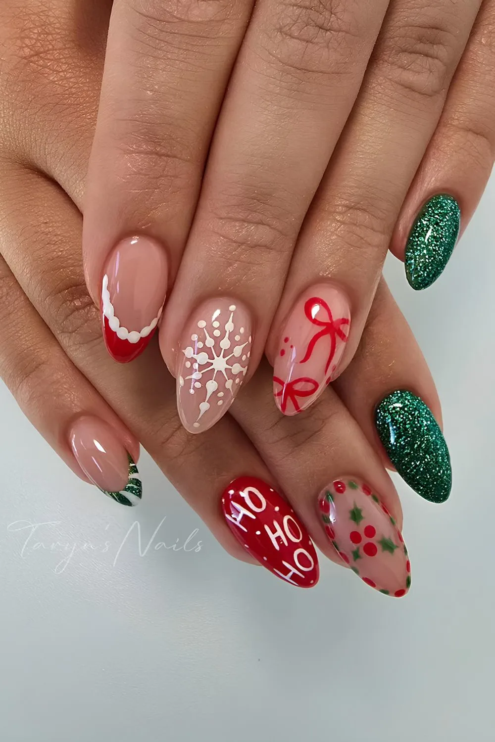 Red and green nails with glitter and Christmas accents