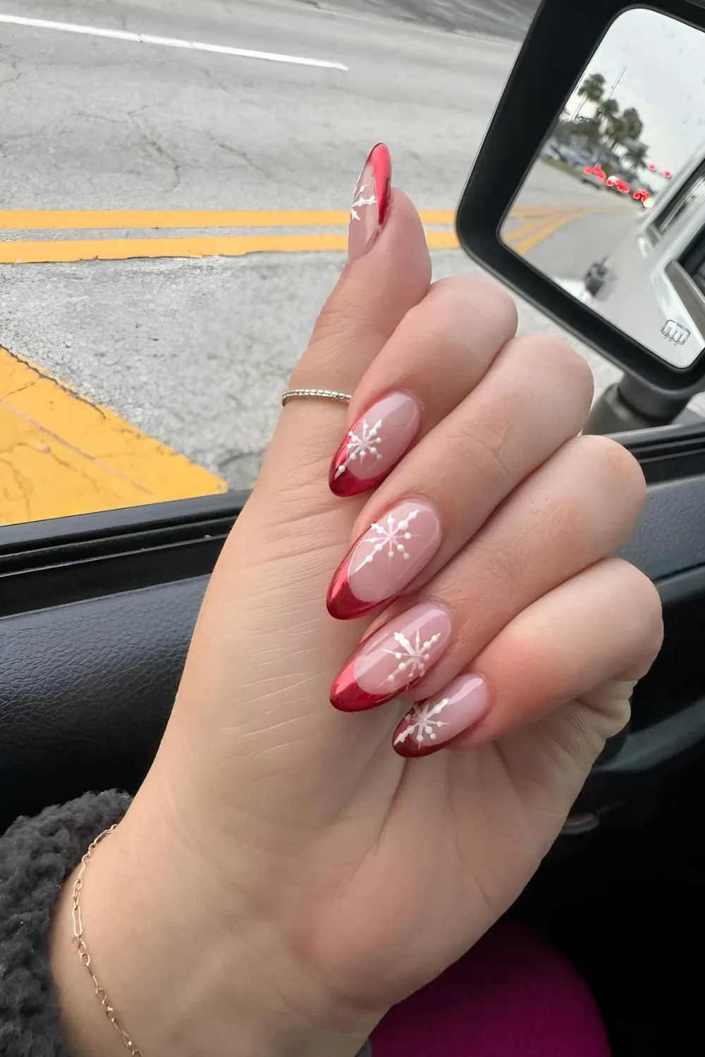 Red chrome French mani with snowflakes