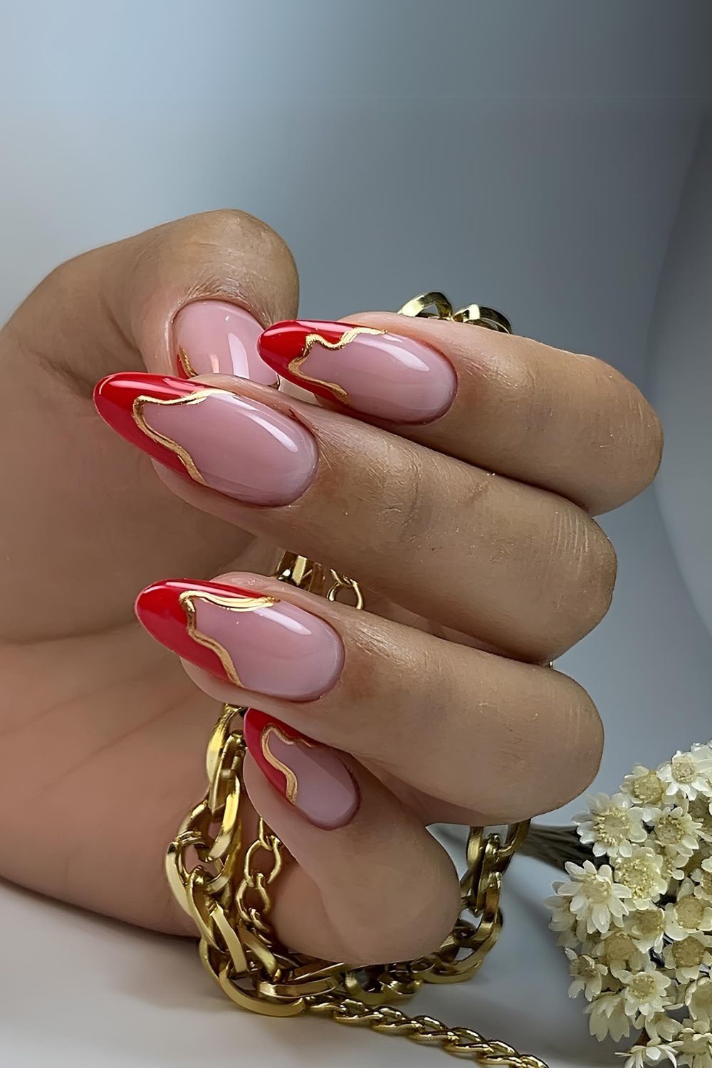 Red drip-effect French tip nails