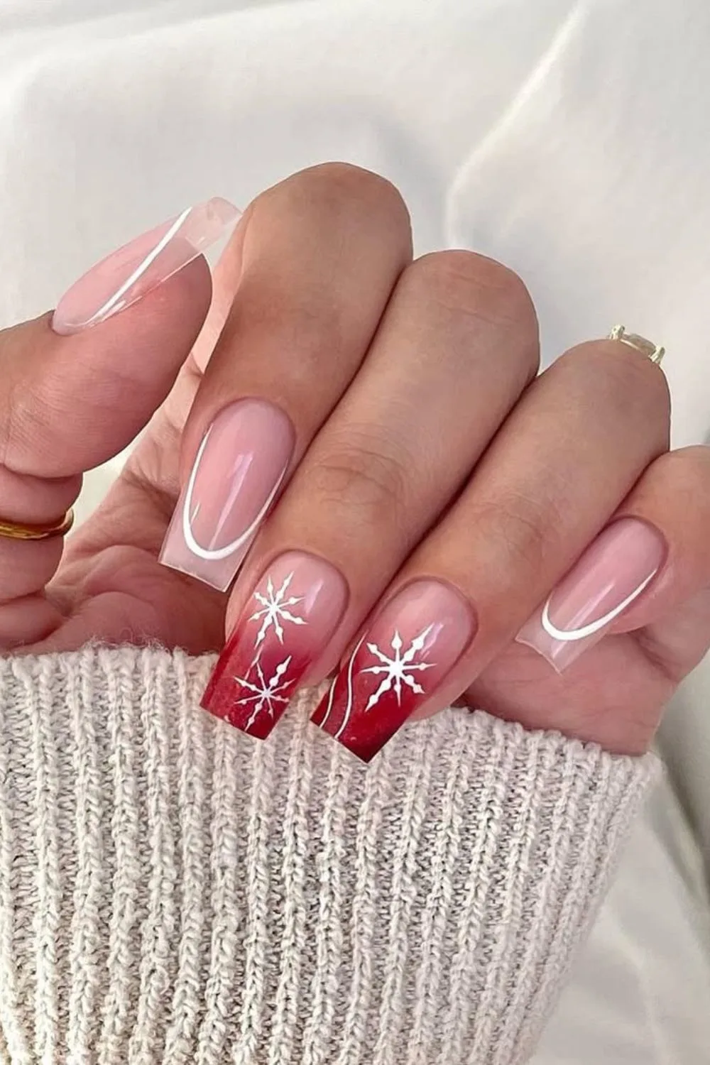 Red glitter ombre French tip nails with snowflakes