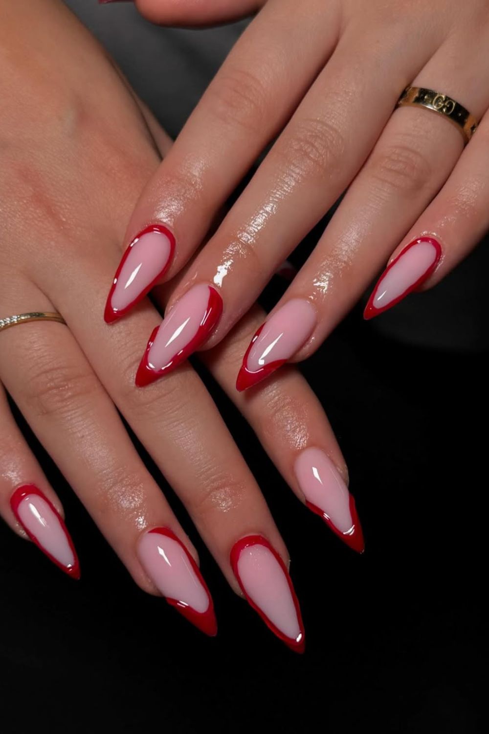 Red outlined French tip nails