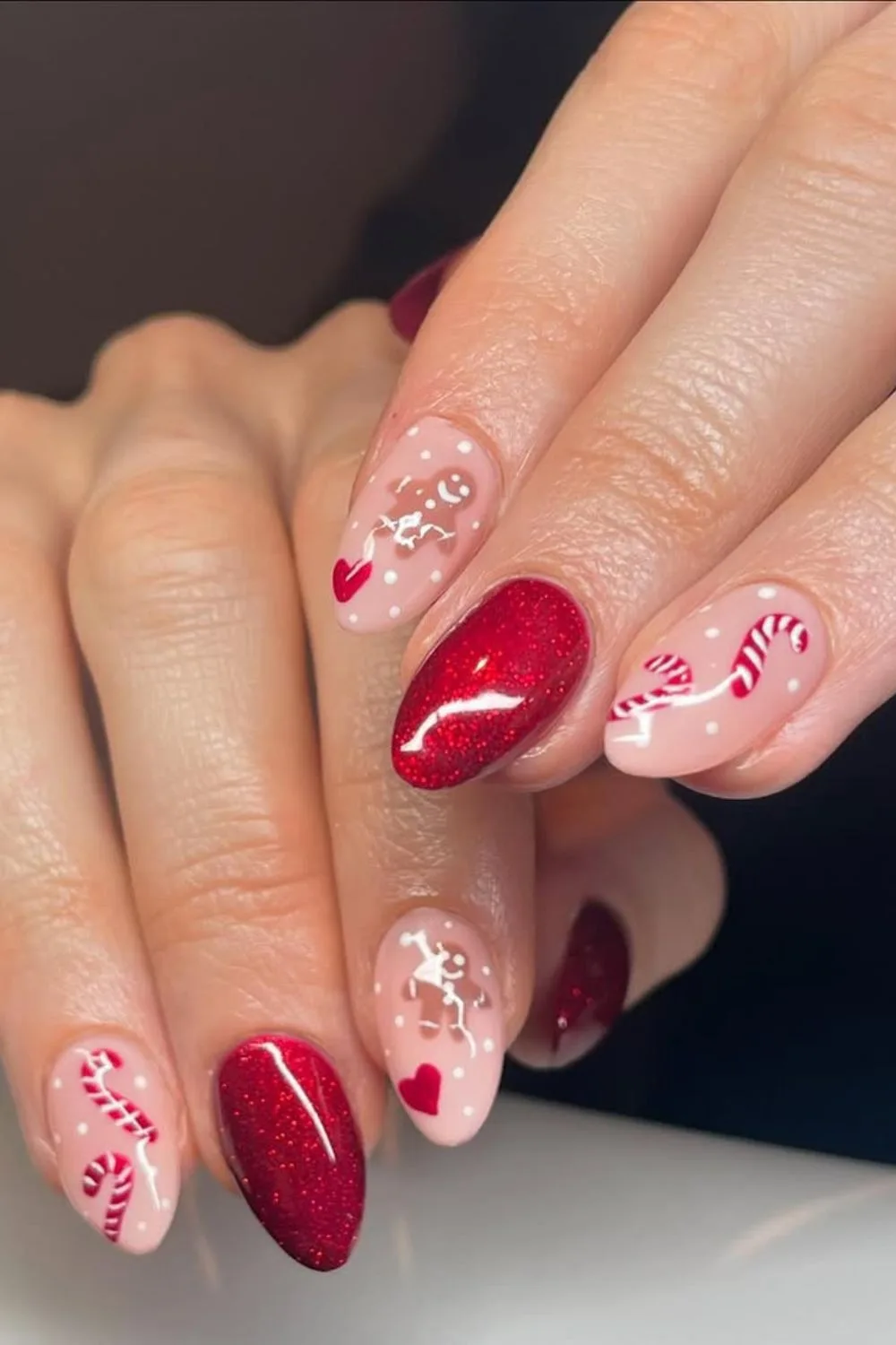 Red vlevet nails with gingerbread and candy cane accents