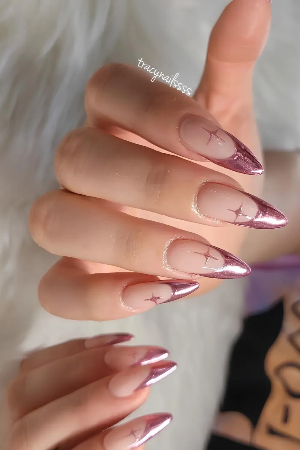 Rose gold French nails with celestial accents