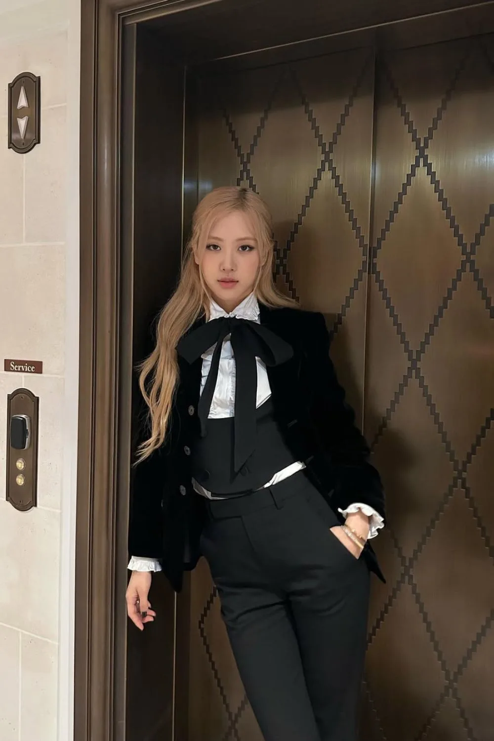 Rosé wearing Yves Saint Laurent outfit