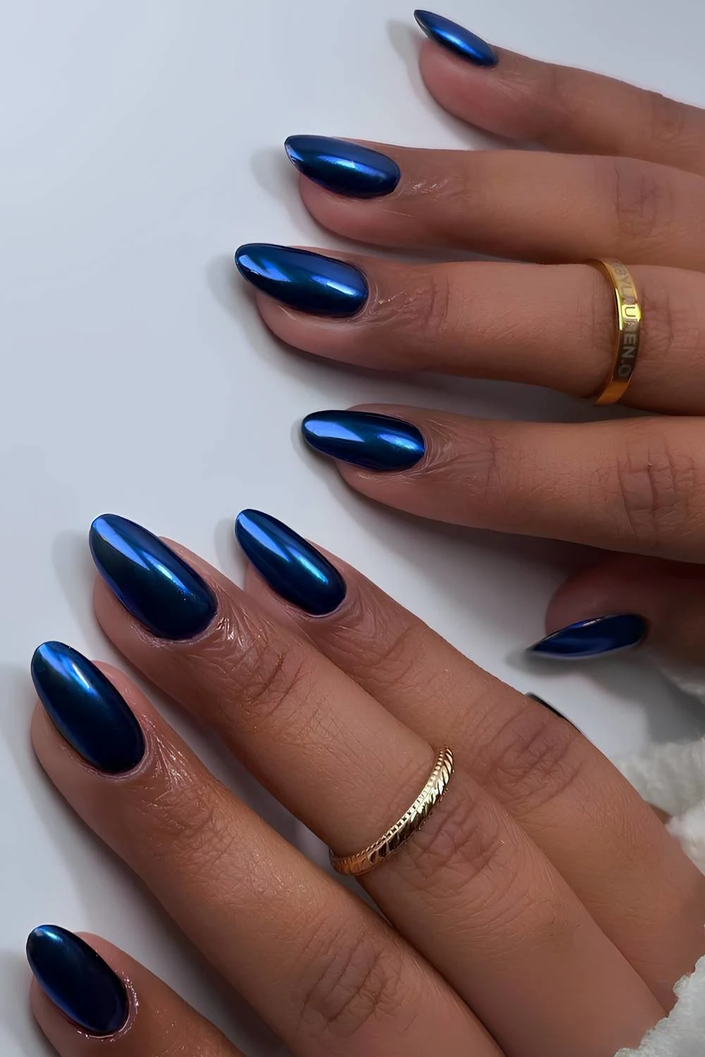 Sapphire blue chrome manicure
