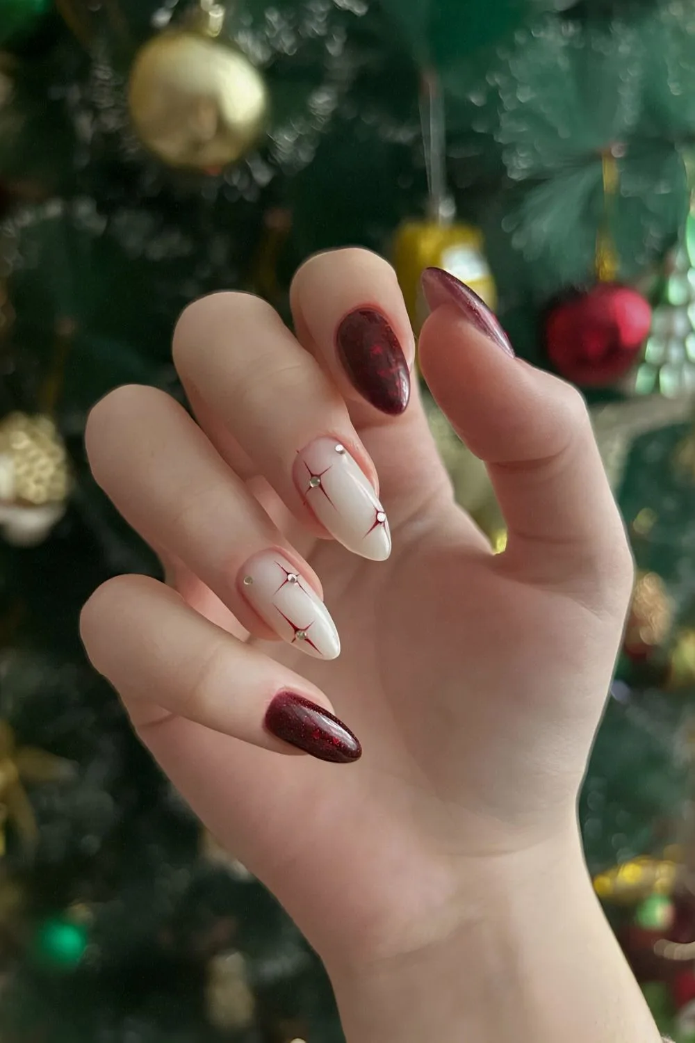 Shimmery dark red celestial nails