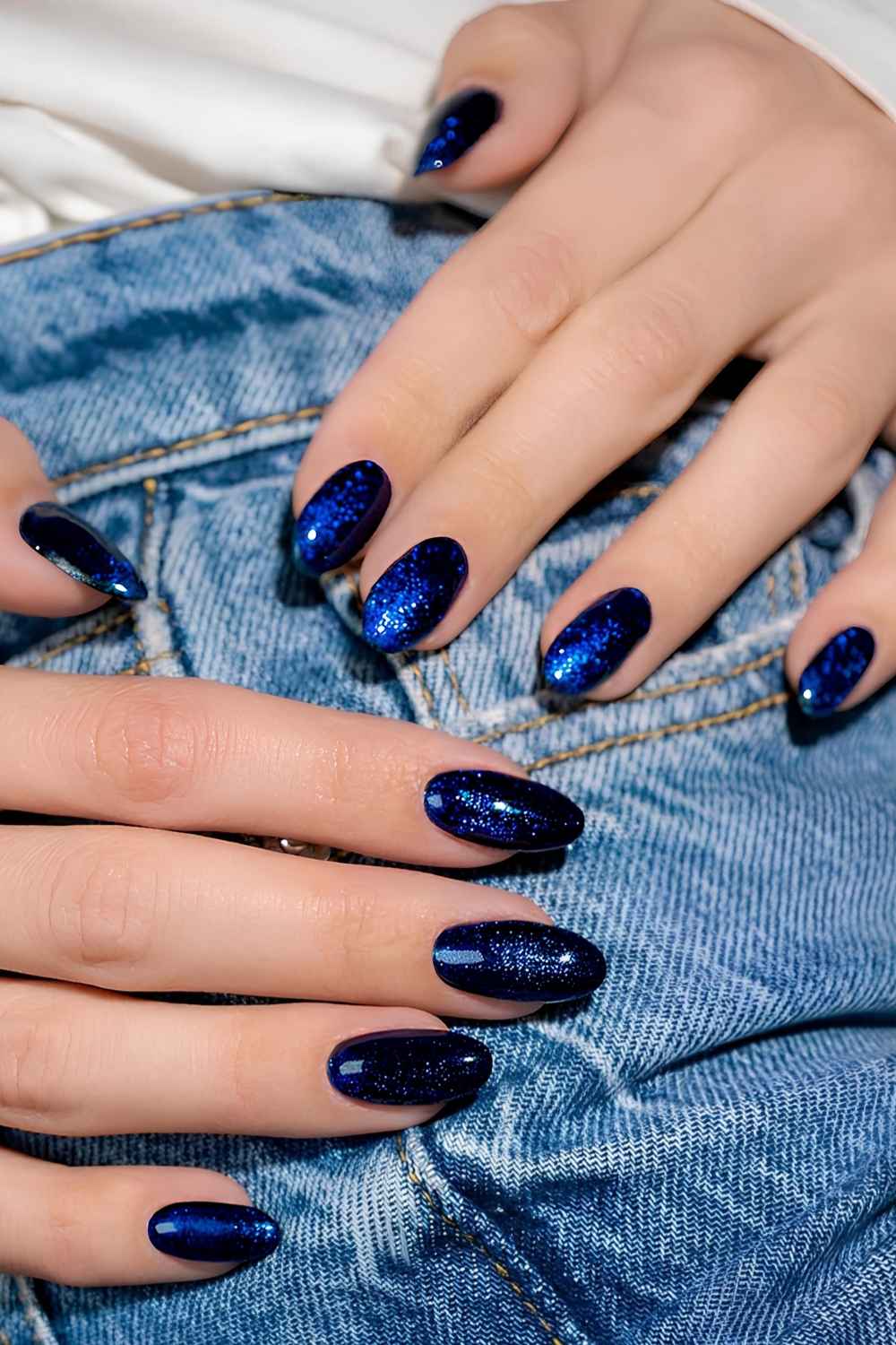 Shimmery sapphire blue manicure