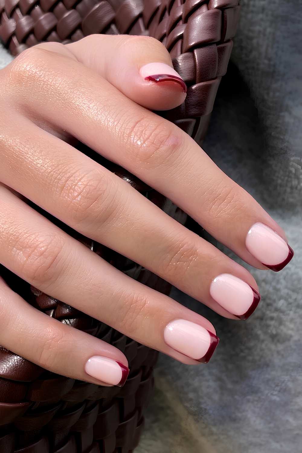 Short burgundy French tip mani